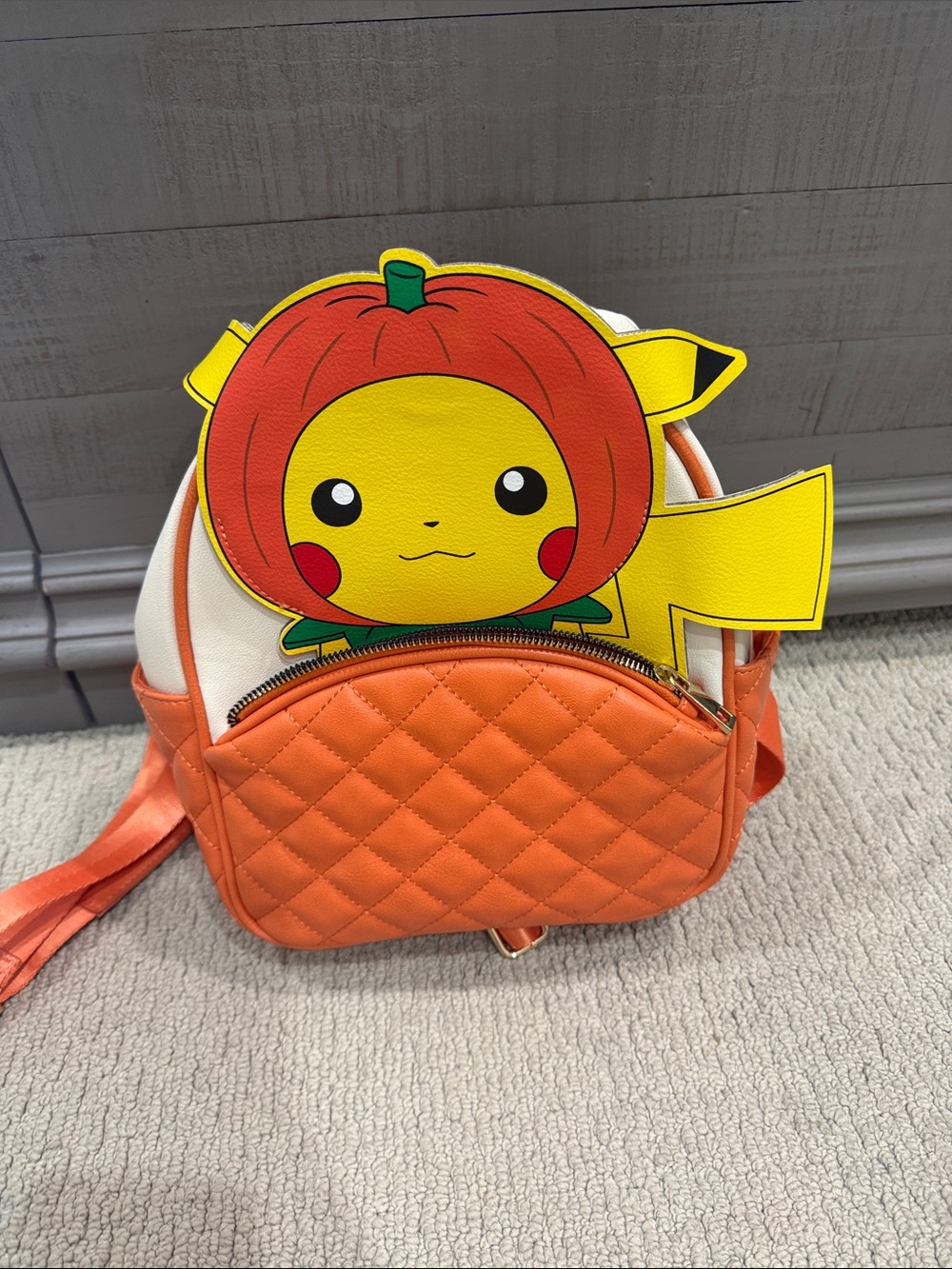 Kids Orange Quilted Backpack with Pikachu Pumpkin Design